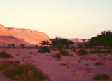 The sun rising over Wadi Hamra